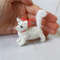 Tiny-white-kitty-toy.jpg