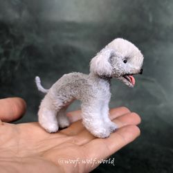 Bedlington Terrier. Realistic mini toy. Miniature puppy