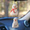 Snowmen are a car accessory or decoration for a Christmas tree..jpeg