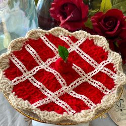 crocheted cherry pie measures approximately 7 inches wide