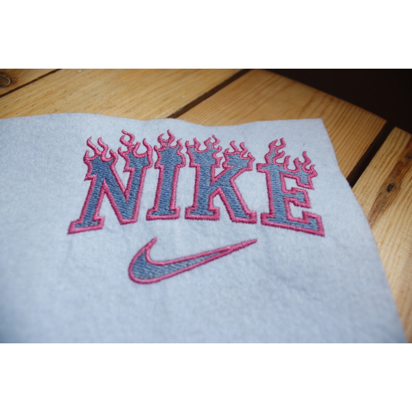 custom burning nike logo machine embroidery design