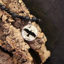 Raven or crow necklace with love rune on the other side. Nacre pearl pendant