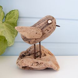 A small wooden bird made of driftwood, decoration of any interior and a great gift in a nautical style, decor for home