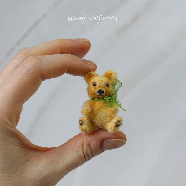 teddy-bear-mini-toy-in-hand.jpg