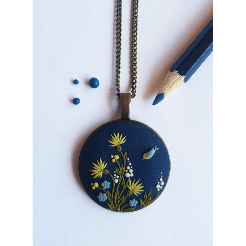 Polymer clay flower pendant.jpg