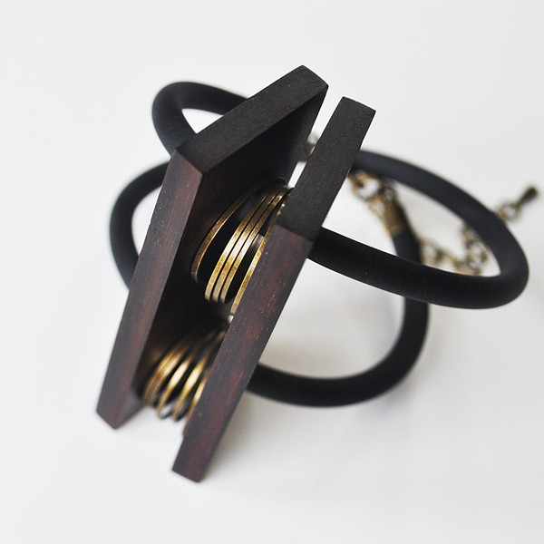 geometric wooden bracelet with metal elements 1