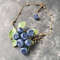 bracelet-blueberries-and-leaves-polymer-clay-on-branch.jpg