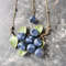necklace-blueberries-and-leaves-polymer-clay-on-branch.jpg