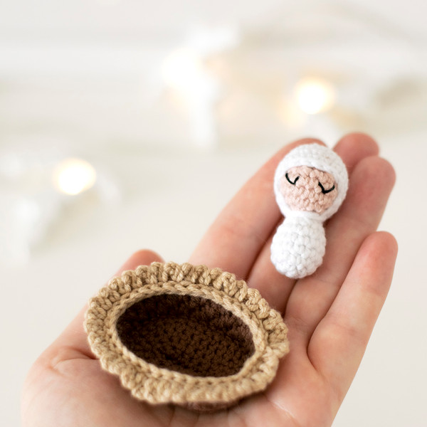 crocheted baby jesus figurine
