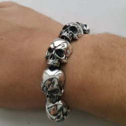 Silver bracelet made of skulls. Sterling Silver.
