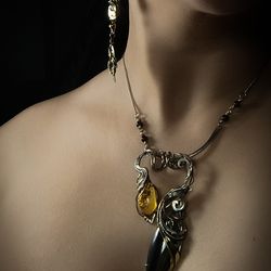 Wire wrapped asymmetrical necklace with simbircite and amber for woman
