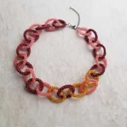 Colorful pink, burgundy and gold beaded necklace, statement jewelry