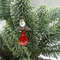 red angel on christmas tree.jpeg