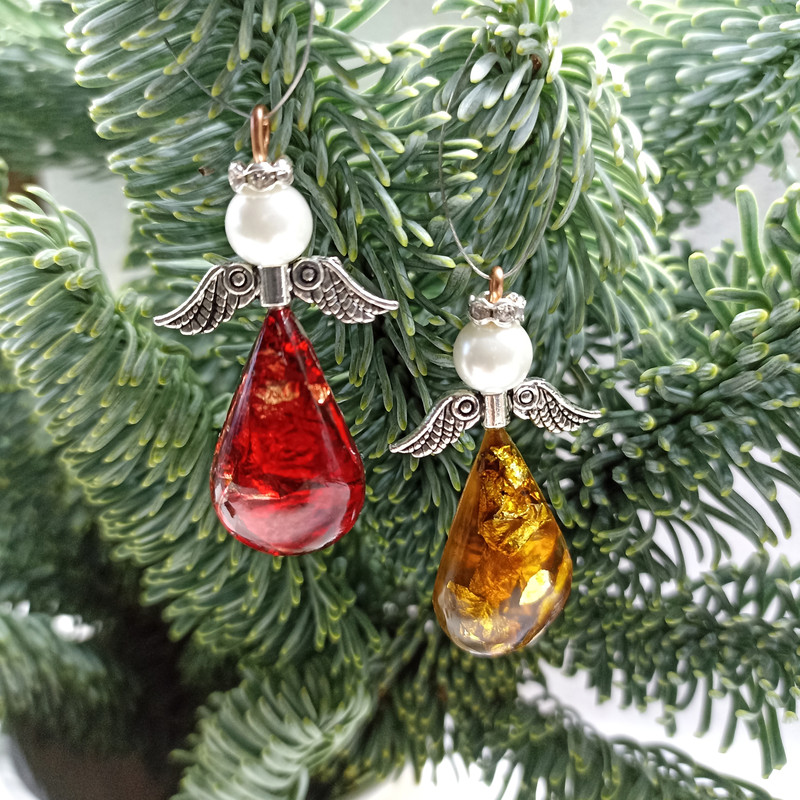 angel ornaments on christmas tree.jpeg