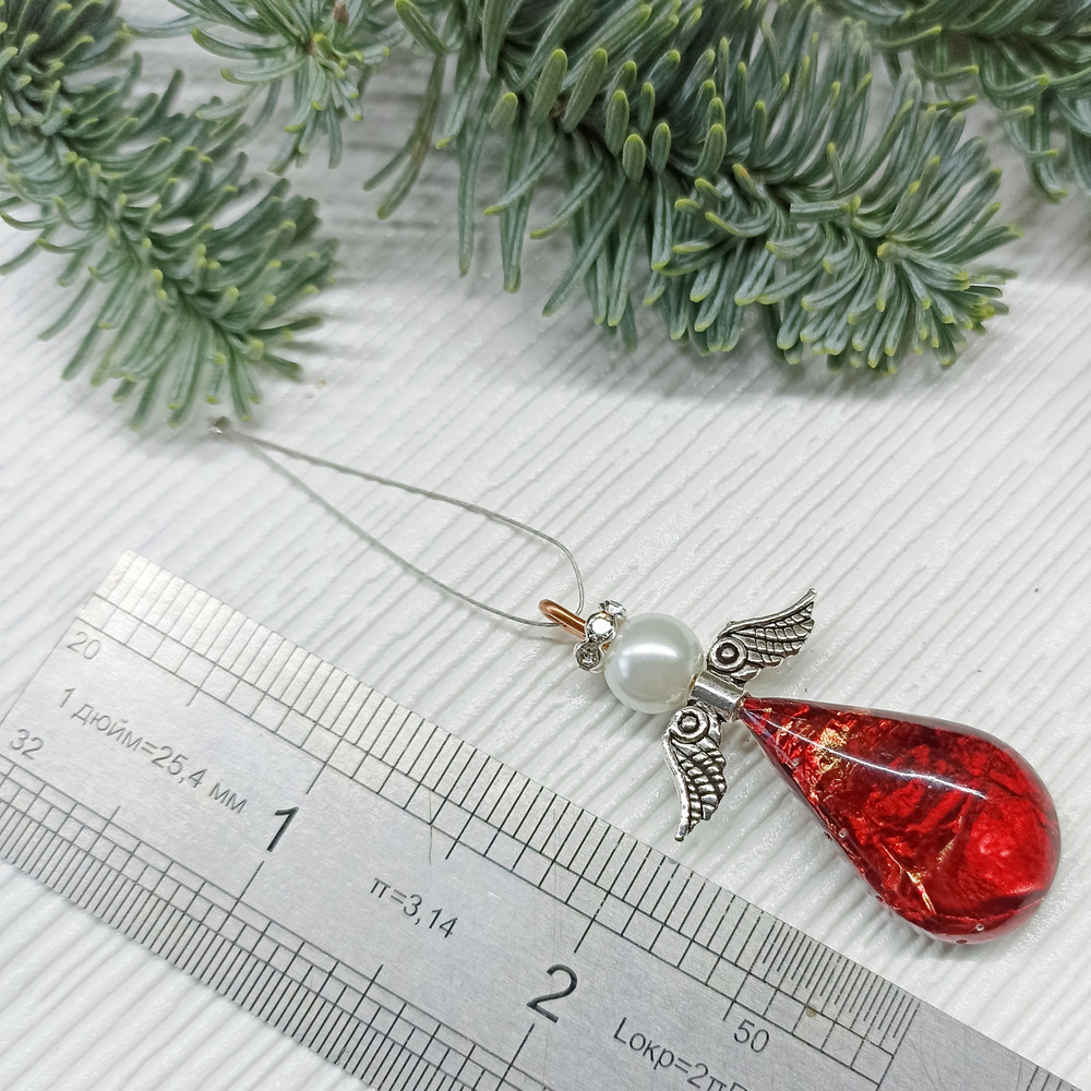 red angel ornament.jpeg