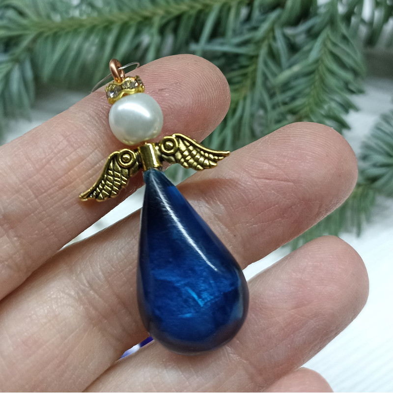 cyan angel ornament.jpeg