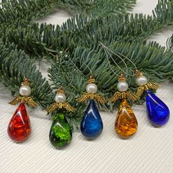 Angel ornaments set. Red, yellow, green, cyan, blue angels for Christmas tree. Christmas decoration