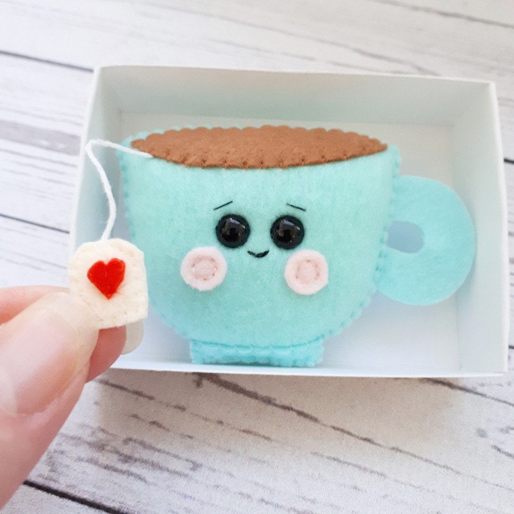 Blue-tea-cup-pocket-hug