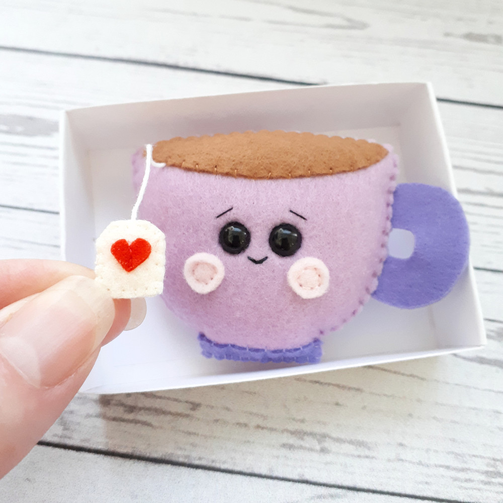 Purple-tea-cup-pocket-hug