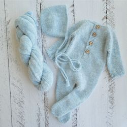 Light blue fluffy bonnet, romper, wrap. Newborn photo props
