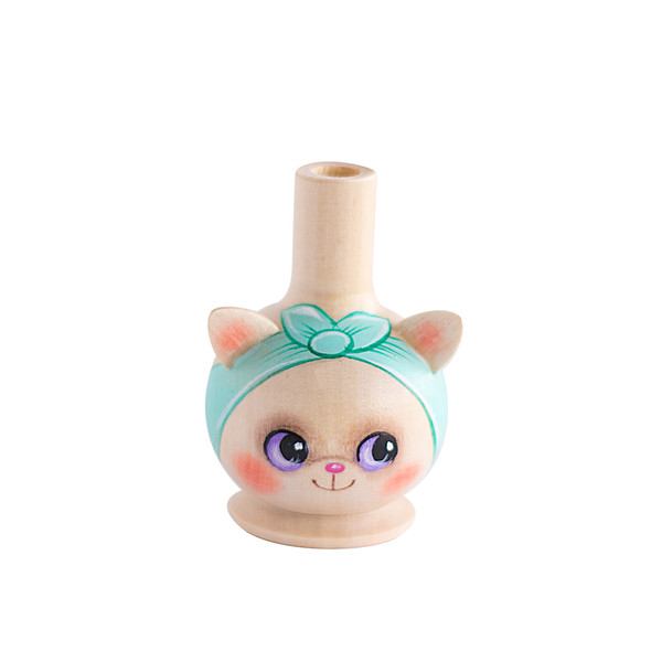 wooden whistle cat with a turquoise headband