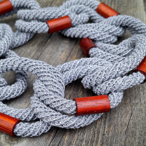blue crochet cord and red wooden elements