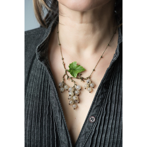 Necklace-with-white-currants-and-green-leaf-on-chain..jpg