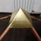 Folding-pyramid-with-gold-cap