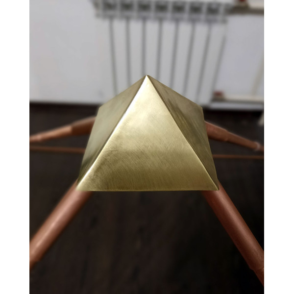 Folding-pyramid-with-gold-cap
