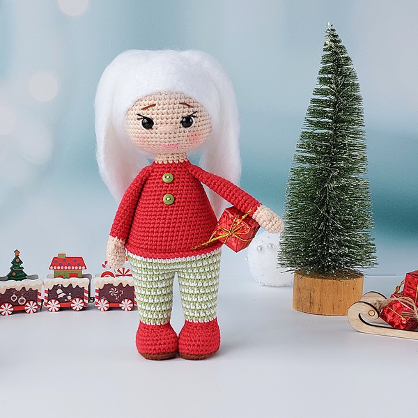 crocheted-doll-in-a-red-sweater-and-Christmas-gifts.jpg