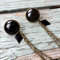 Black minimalist collar brooch with chain.jpg