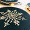 Cross Stitching Snowflake