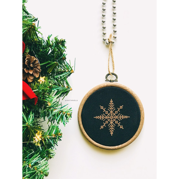 bronze snowflake cross stitch