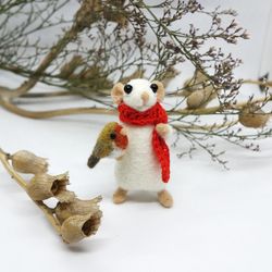 Miniature needle felted mouse with a robin in his paw