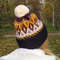 Knitted-jacquard-hat-with-a-pompom-3