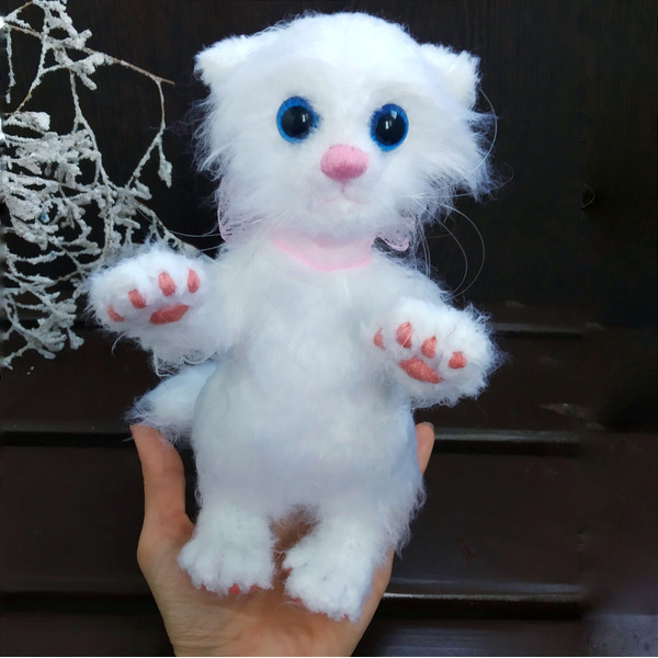 white kitty toy.jpg