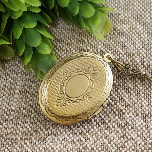 oval-brass-bronze-keepsake-photo-locket-pendant-necklace-jewelry