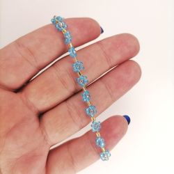 blue bracelet, baby blue bracelet, beaded bracelet, handmade bracelet, daisy bracelet, delicate jewelry,beaded bracelets