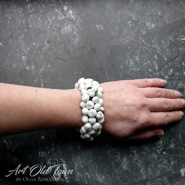 Bracelet with snowberry and leaves on waxed cords available-On-the-hand.jpg