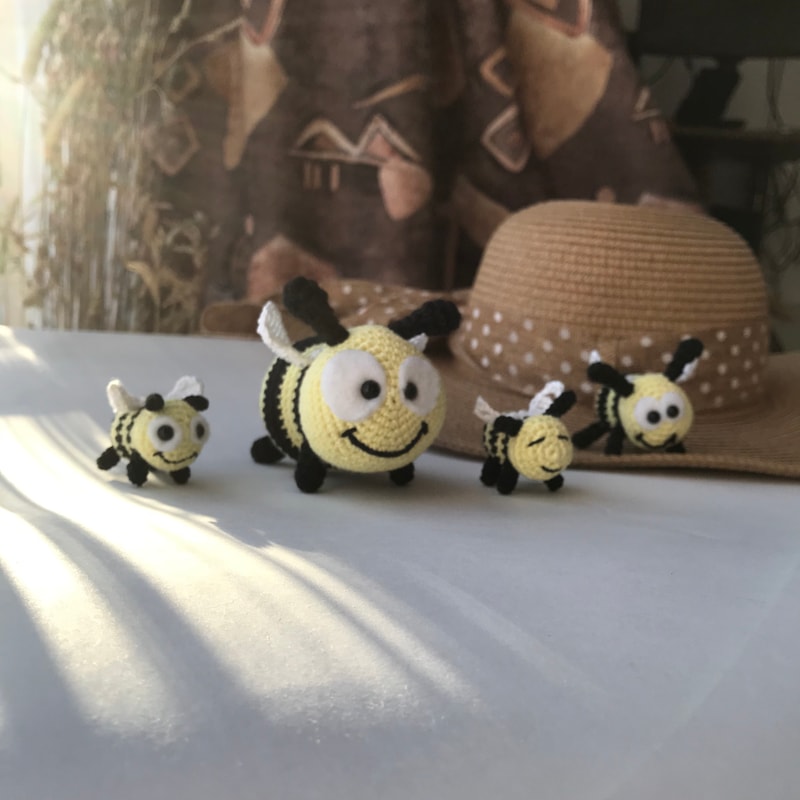 4 bees on the background of the hat