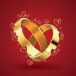 two wedding rings in heart shape and red hearts