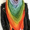 bright-hand-knit-scarf-above-the-leather-jacket.jpg