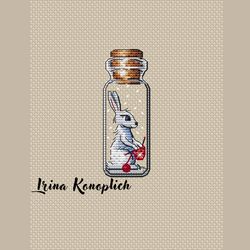 a tangle of warmth cross stitch pattern, hare in bottle cross stitch pattern, jar cross stitch pattern, winter