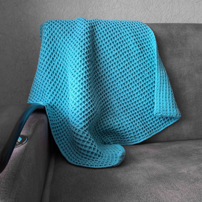 Waffle blue crochet blanket on the sofa 2.jpg