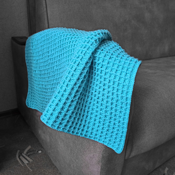 Waffle blue crochet blanket on the sofa 3.jpg