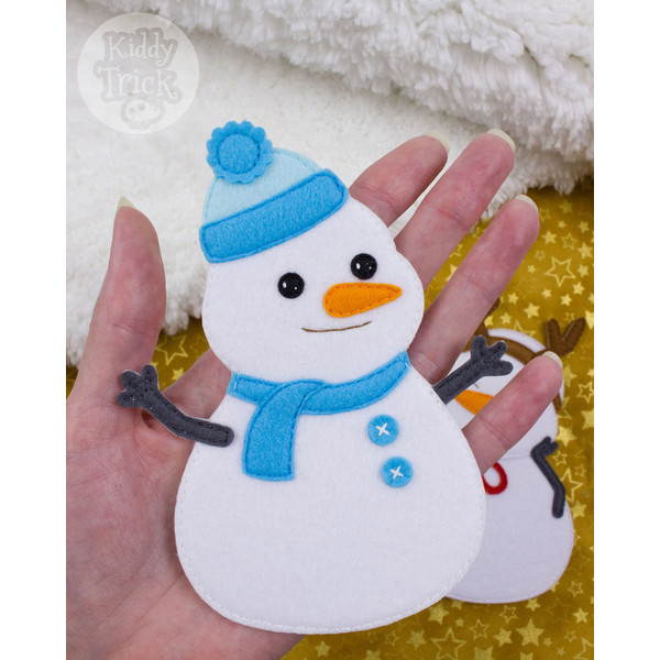 felt snowman with blue hat and scarf