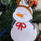 snowman with antlers on christmas tree