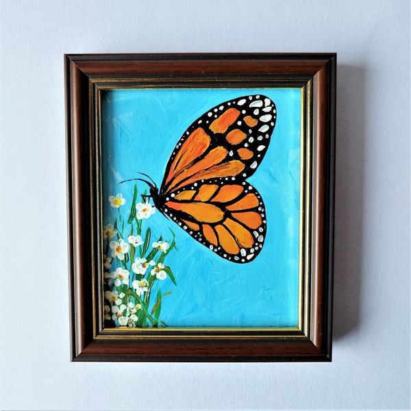 Handwritten-a-monarch-butterfly-sits-on-a-wildflower-by-acrylic-paints-1.jpg