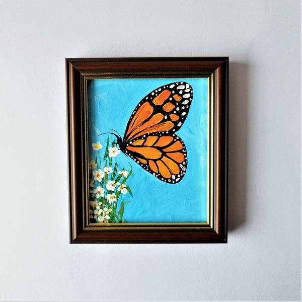Handwritten-a-monarch-butterfly-sits-on-a-wildflower-by-acrylic-paints-2.jpg