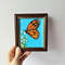 Handwritten-a-monarch-butterfly-sits-on-a-wildflower-by-acrylic-paints-3.jpg
